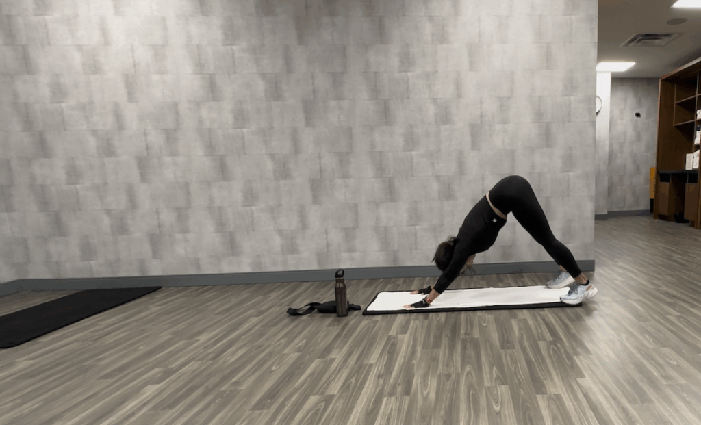 girl on mat doing yoga pose