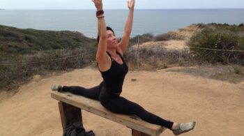 Phoebe Chongchua doing splits on a bench at Torrey Pines